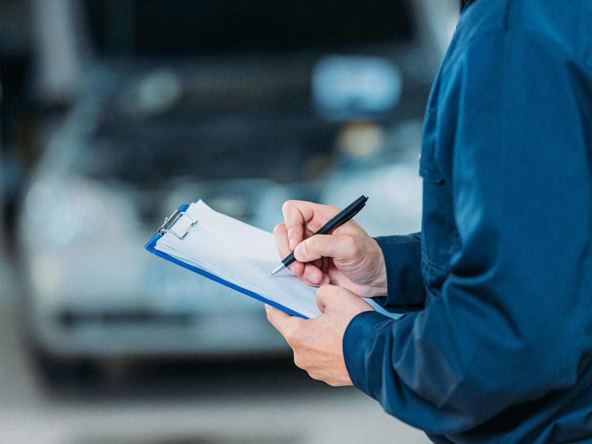 Insurance claim paperwork being completed at the workshop